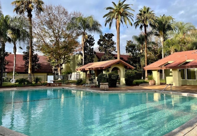 view of swimming pool featuring a patio