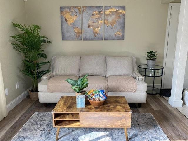 living room featuring dark hardwood / wood-style floors