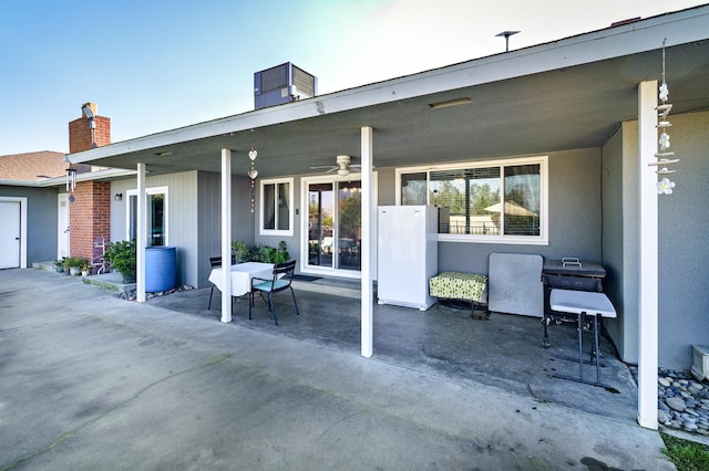 view of patio featuring cooling unit and ceiling fan