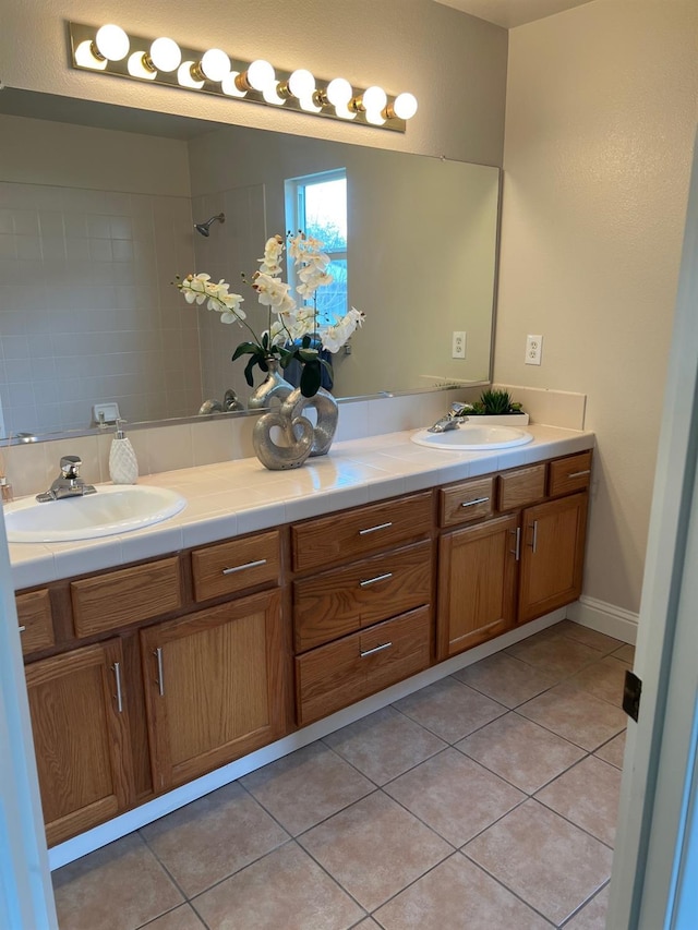 bathroom featuring vanity and tile patterned flooring