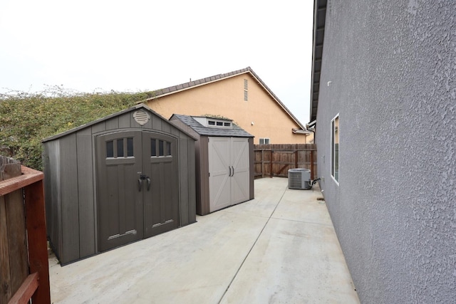 view of outbuilding with central air condition unit