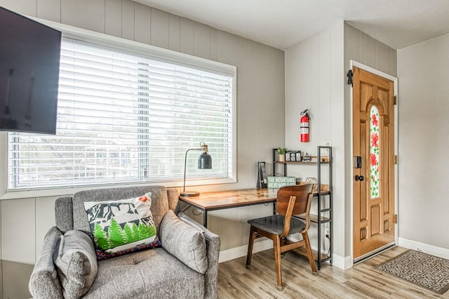 office with light hardwood / wood-style floors