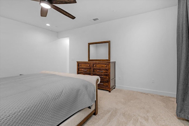 bedroom with light colored carpet and ceiling fan