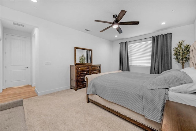 carpeted bedroom featuring ceiling fan