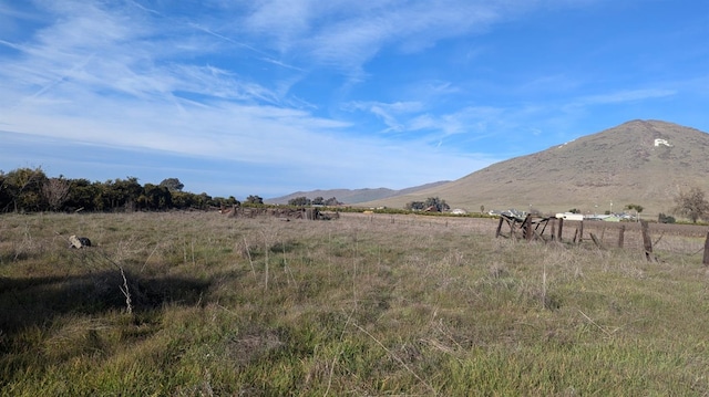 property view of mountains featuring a rural view