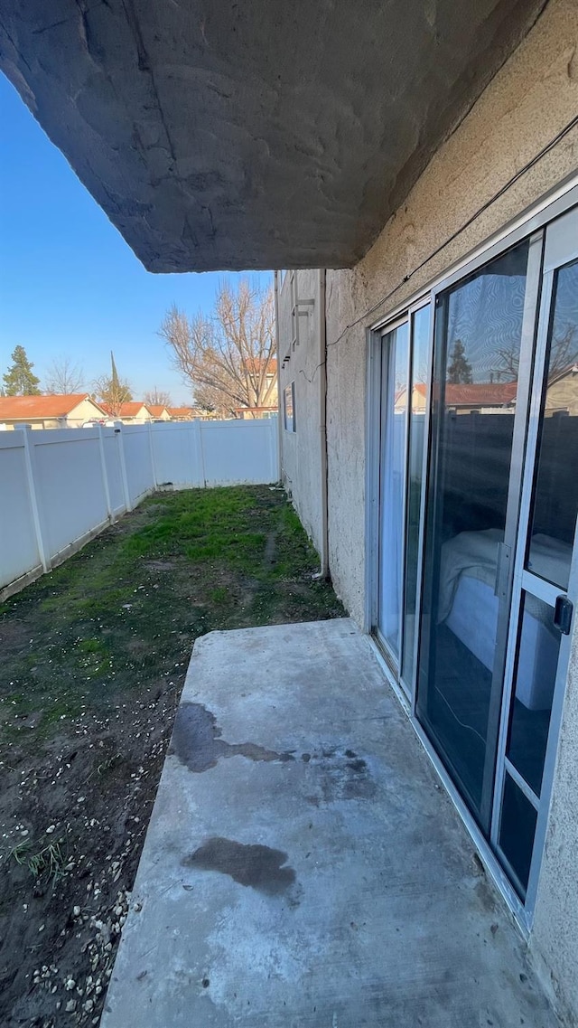 fenced backyard featuring a patio area