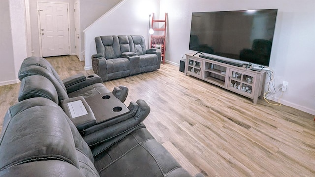 living room with light hardwood / wood-style flooring