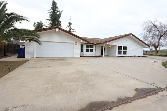 ranch-style home with a garage