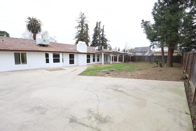 exterior space featuring cooling unit and a patio area