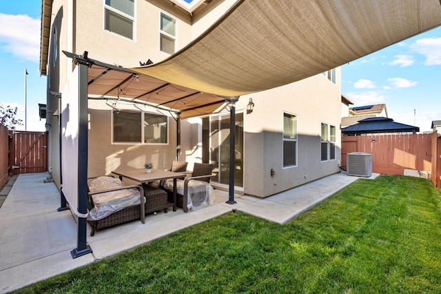 back of property featuring cooling unit, a lawn, and a patio area