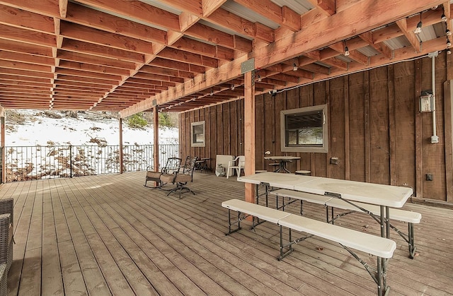 view of snow covered deck