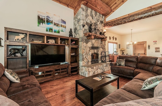 living room with wood ceiling, high vaulted ceiling, hardwood / wood-style floors, and a notable chandelier
