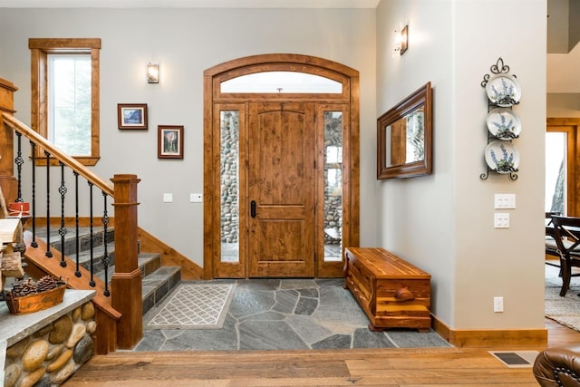 entrance foyer featuring hardwood / wood-style floors