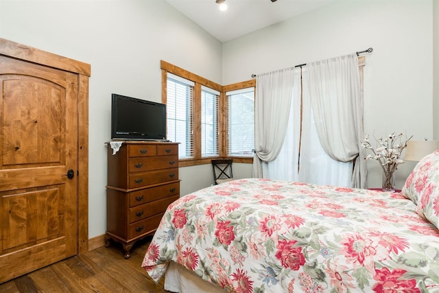 bedroom with hardwood / wood-style floors