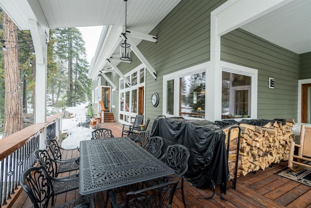 wooden deck featuring ceiling fan