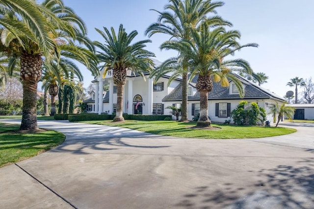 view of front of home with a front yard