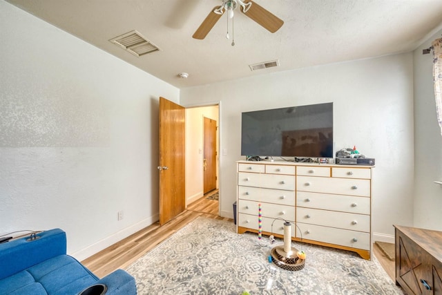 interior space featuring ceiling fan and light hardwood / wood-style flooring