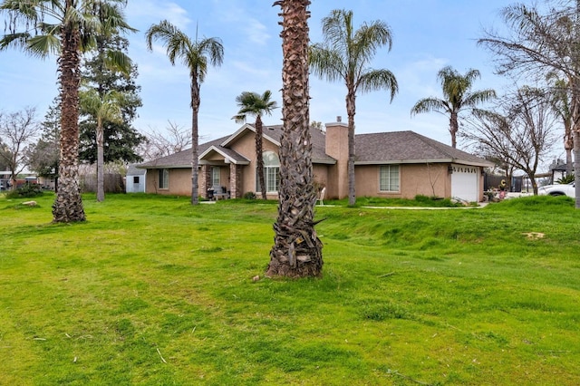 view of front facade featuring a front lawn, a shingled roof, an attached garage, and stucco siding
