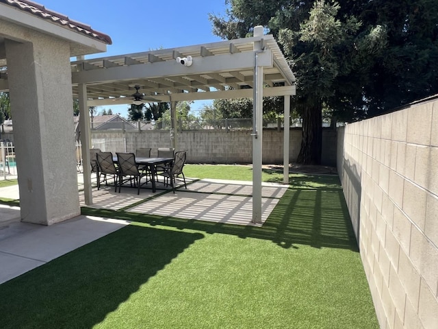 view of yard with a patio and a pergola