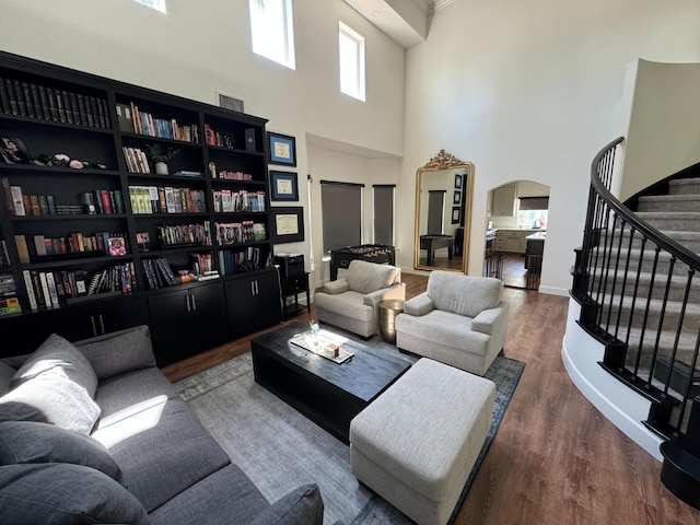 living room featuring dark wood-type flooring