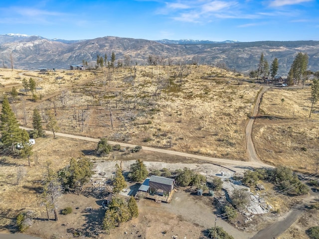 bird's eye view with a mountain view and a rural view