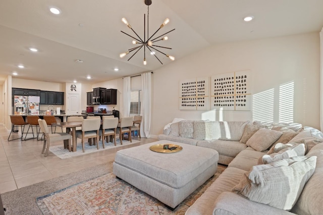 tiled living room with lofted ceiling and a chandelier