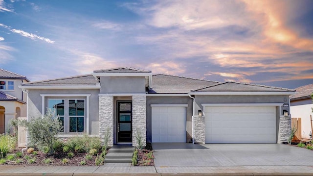 prairie-style home with a garage