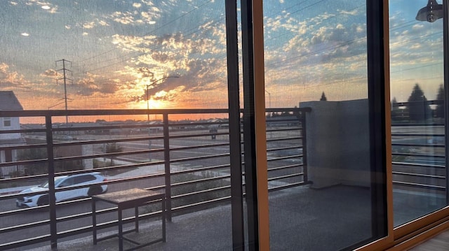 view of balcony at dusk