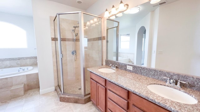 bathroom featuring plus walk in shower and vanity