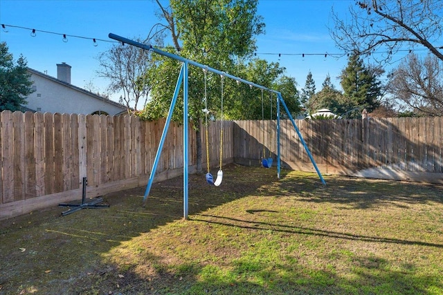 view of play area featuring a yard