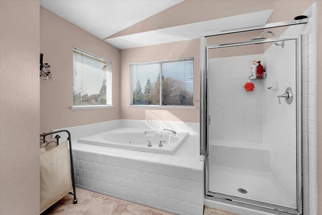 bathroom with plus walk in shower and vaulted ceiling