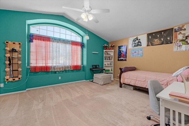 carpeted bedroom featuring vaulted ceiling and ceiling fan