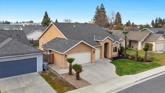 ranch-style house with a garage and a front yard