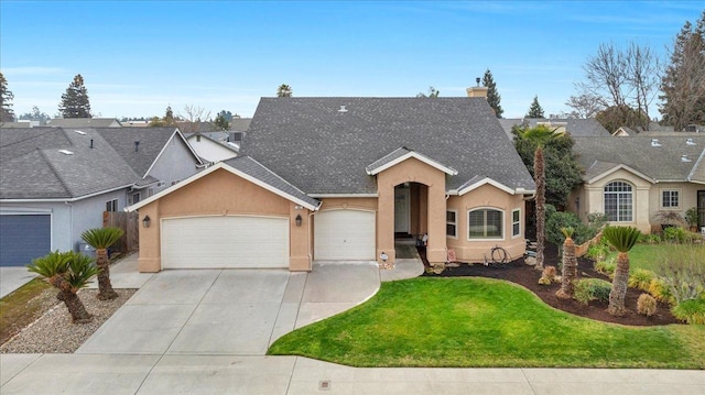 ranch-style house with a garage and a front lawn