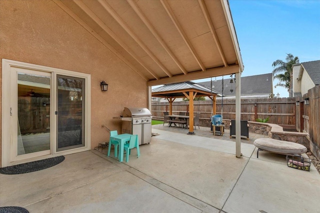 view of patio / terrace with a gazebo and grilling area