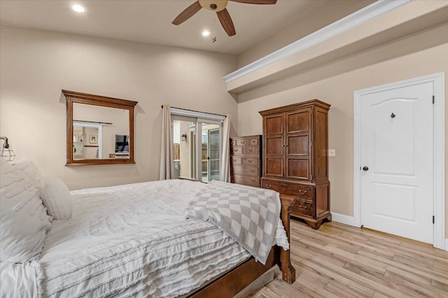 bedroom featuring access to exterior, ceiling fan, and light wood-type flooring