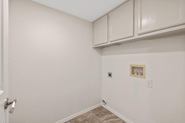 laundry area with cabinets, washer hookup, and hookup for an electric dryer