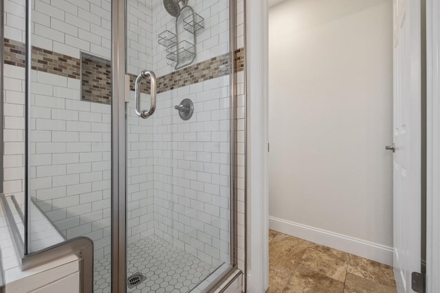 968 E Muncie, Fresno, CA 93720 - bathroom featuring a shower stall and baseboards