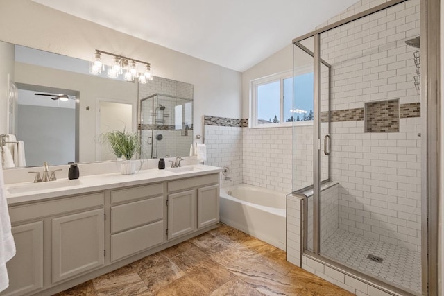 bathroom featuring vaulted ceiling, vanity, ceiling fan, and plus walk in shower