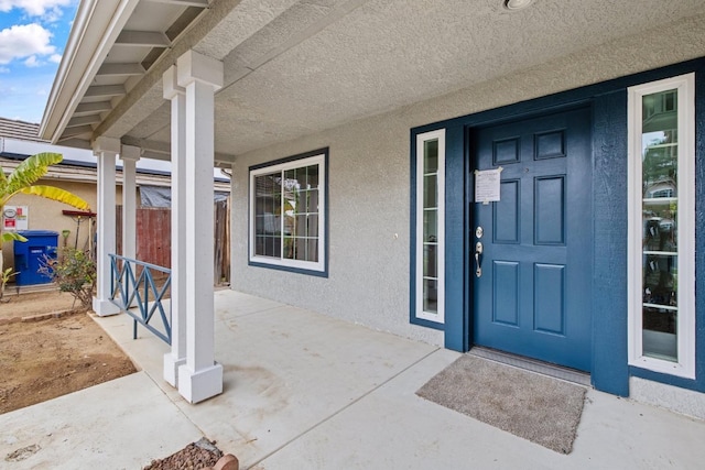 968 E Muncie, Fresno, CA 93720 - entrance to property featuring stucco siding and a porch