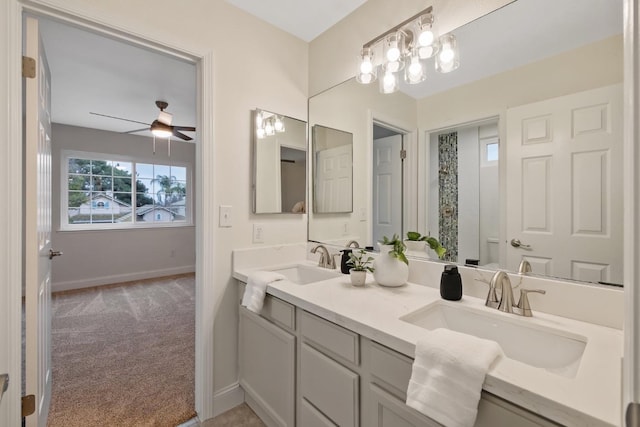 968 E Muncie, Fresno, CA 93720 - bathroom with toilet, baseboards, a ceiling fan, and a sink