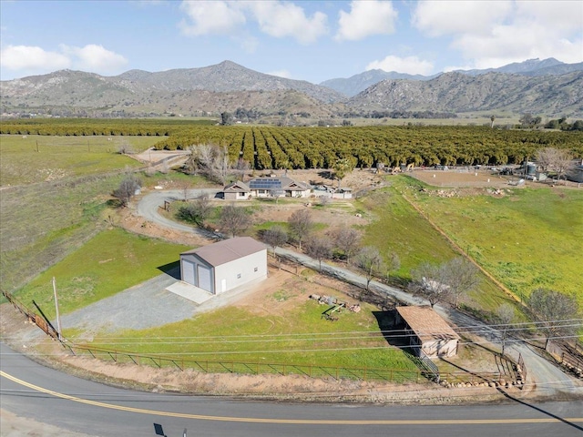 aerial view with a mountain view and a rural view