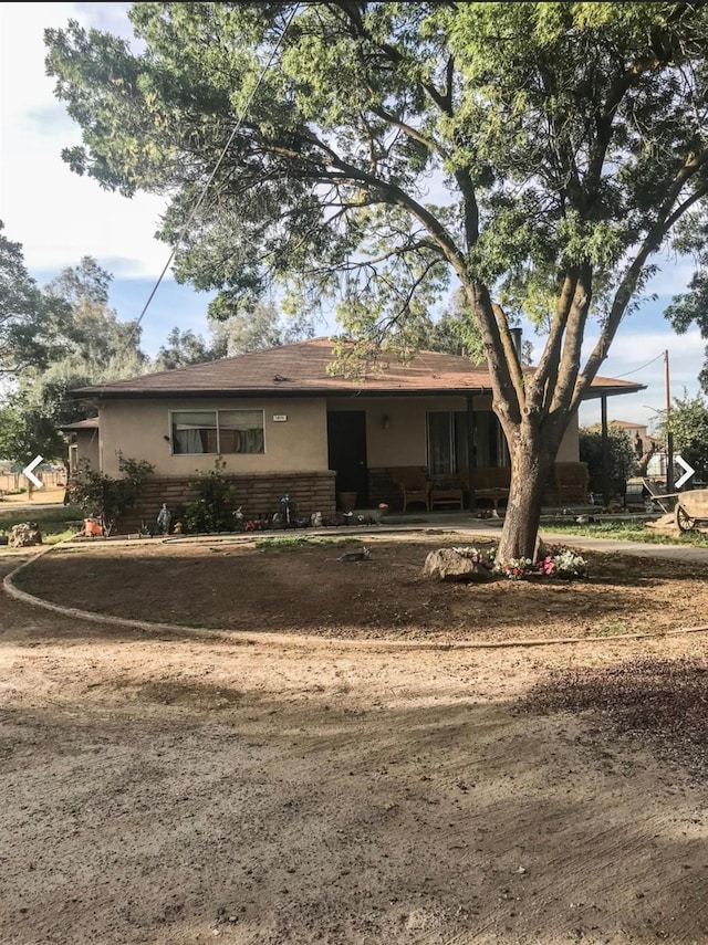 view of front of property featuring brick siding