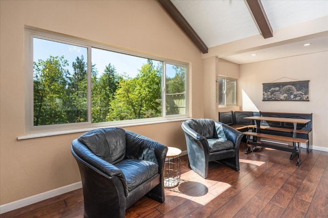 sitting room with hardwood / wood-style floors and lofted ceiling with beams