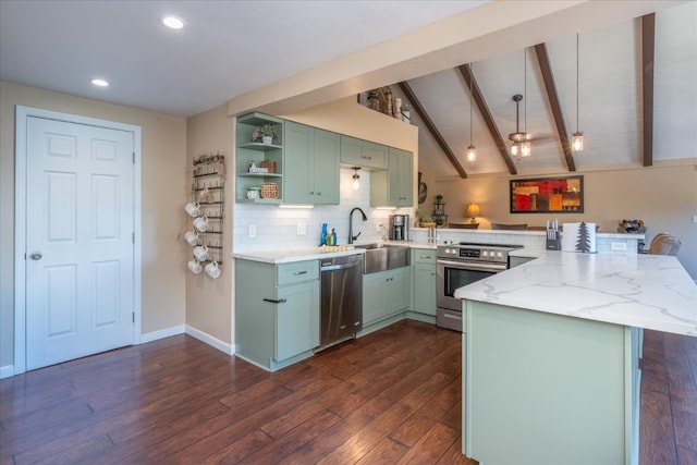 kitchen with appliances with stainless steel finishes, green cabinets, light stone counters, and kitchen peninsula