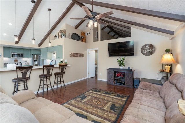 living room featuring beamed ceiling, ceiling fan, dark hardwood / wood-style flooring, and high vaulted ceiling