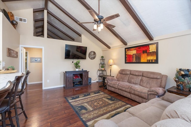 living room with beamed ceiling, ceiling fan, dark hardwood / wood-style floors, and high vaulted ceiling