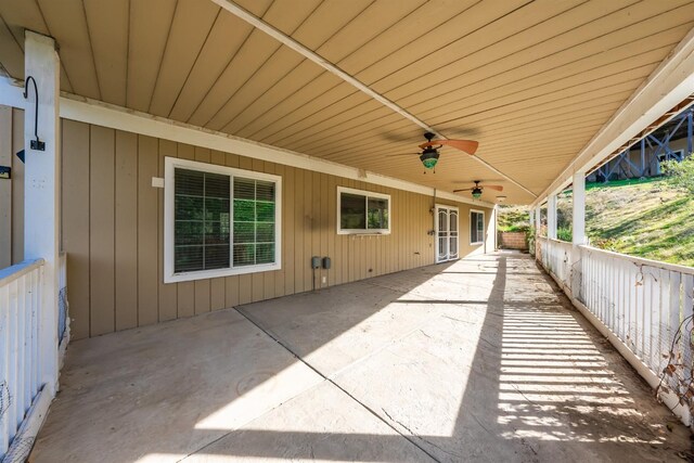 view of patio featuring ceiling fan