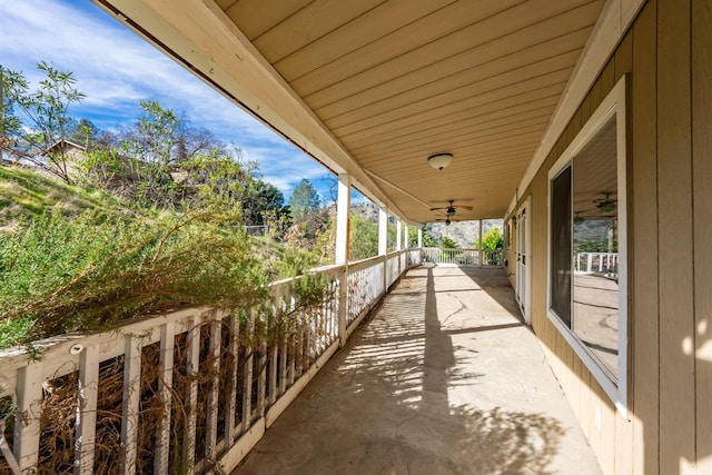 balcony featuring ceiling fan