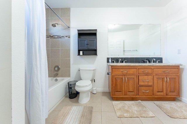 full bathroom with tile patterned floors, vanity, toilet, and shower / tub combo